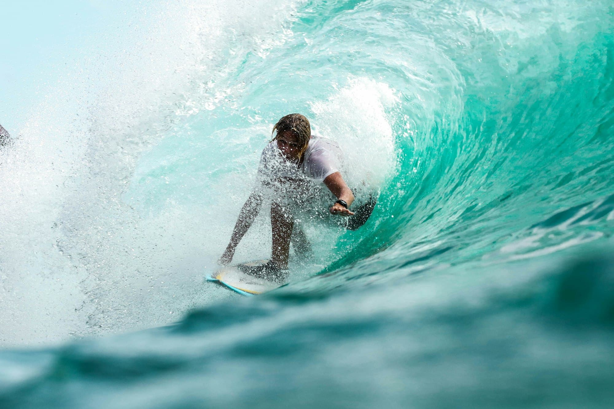 Surfer riding a clean right-hand wave